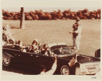 (ZAPRUDER FILM--JFK) A series of 36 film stills and 40 color slides from the Zapruder Film of President Kennedys assassination.